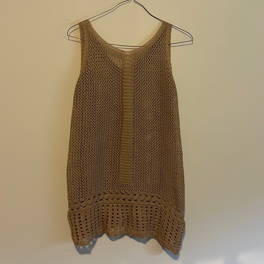 Beautiful laced coverup. Perfect to wear a bathing suit under